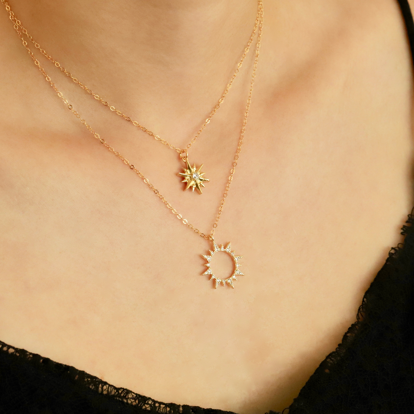 Woman wearing gold filled sunflower necklace and star necklace