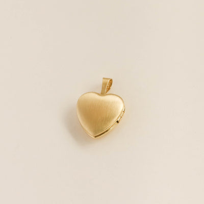 Gold heart pendant locket