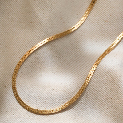 Gold herringbone necklace