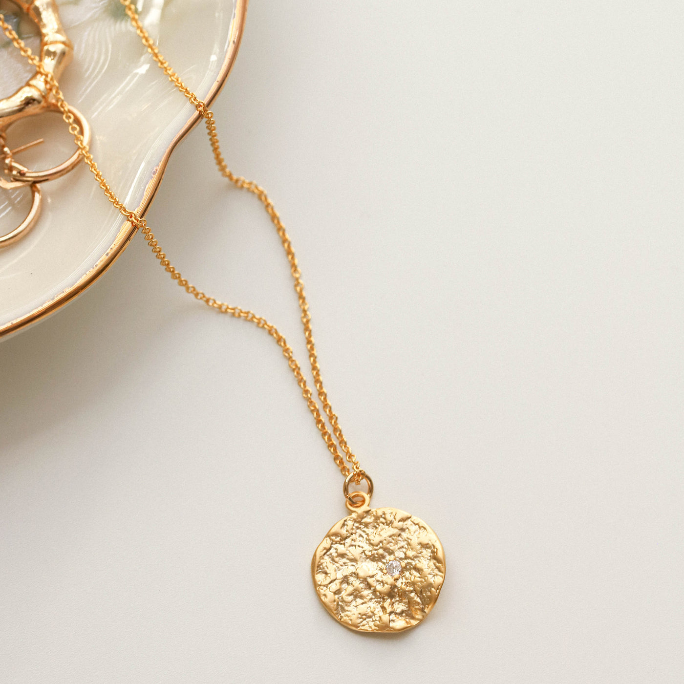 Gold coin pendant necklace