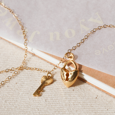 Gold padlock and key charm necklace
