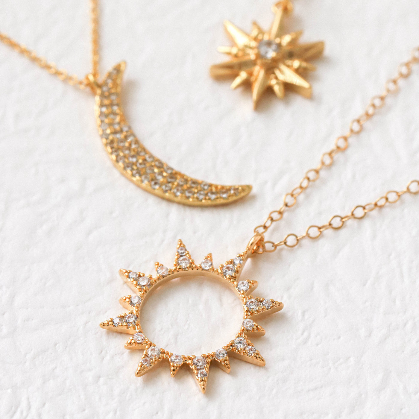 Gold sun pendant necklaces